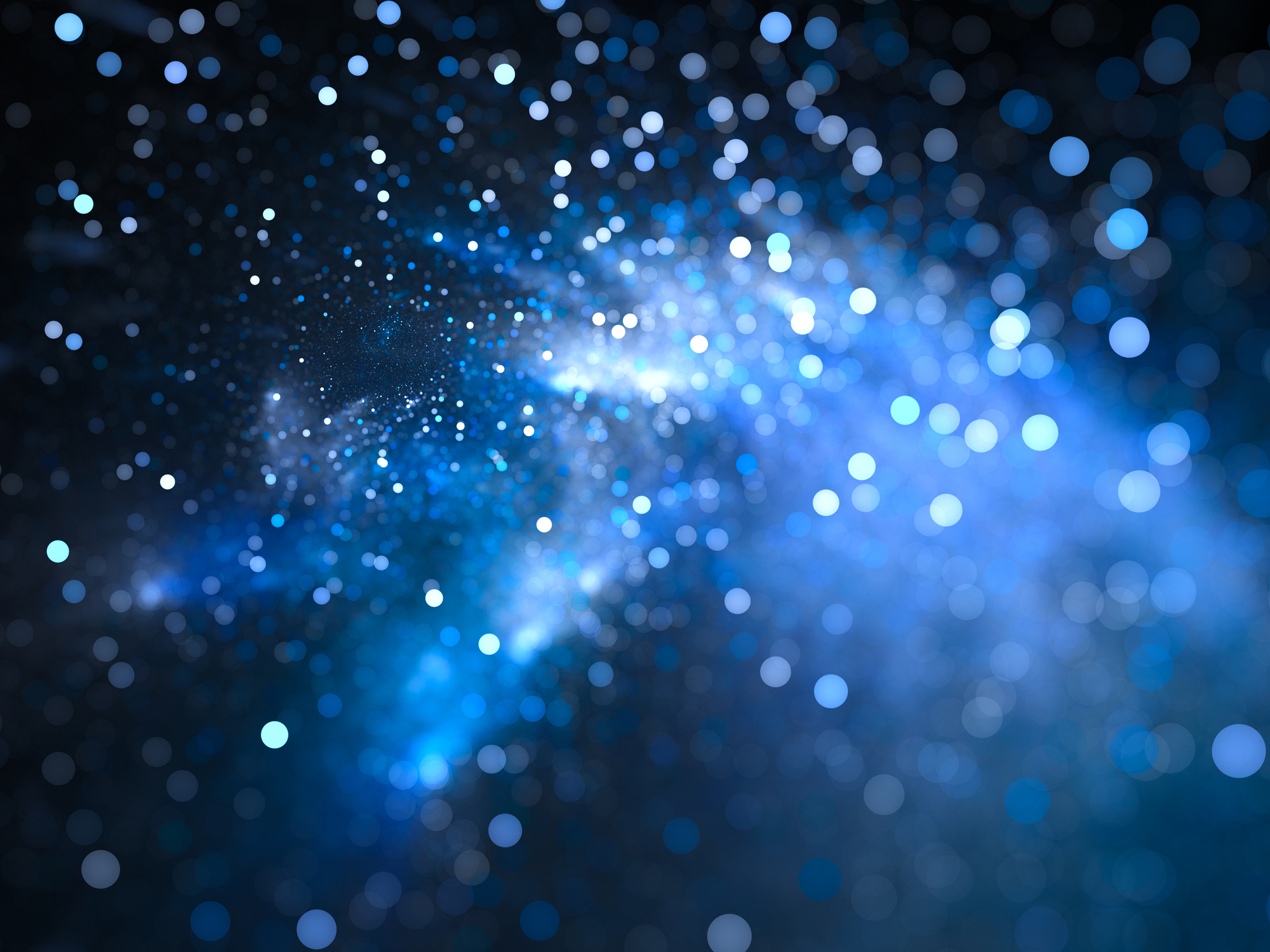 Blue glowing nebula with stars in bokeh, depth of field